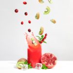 strawberry juice in clear drinking glass