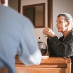 Cheerful senior couple enjoying coffee together in a cozy home setting.